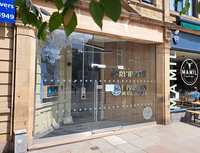 Photo of the glass frontage of the Unmasked premises. Photo of the glass frontage of the Unmasked premises.
